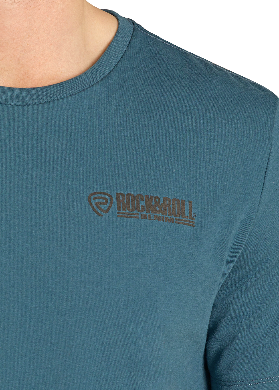 Teal t-shirt with a logo on the chest worn by a person