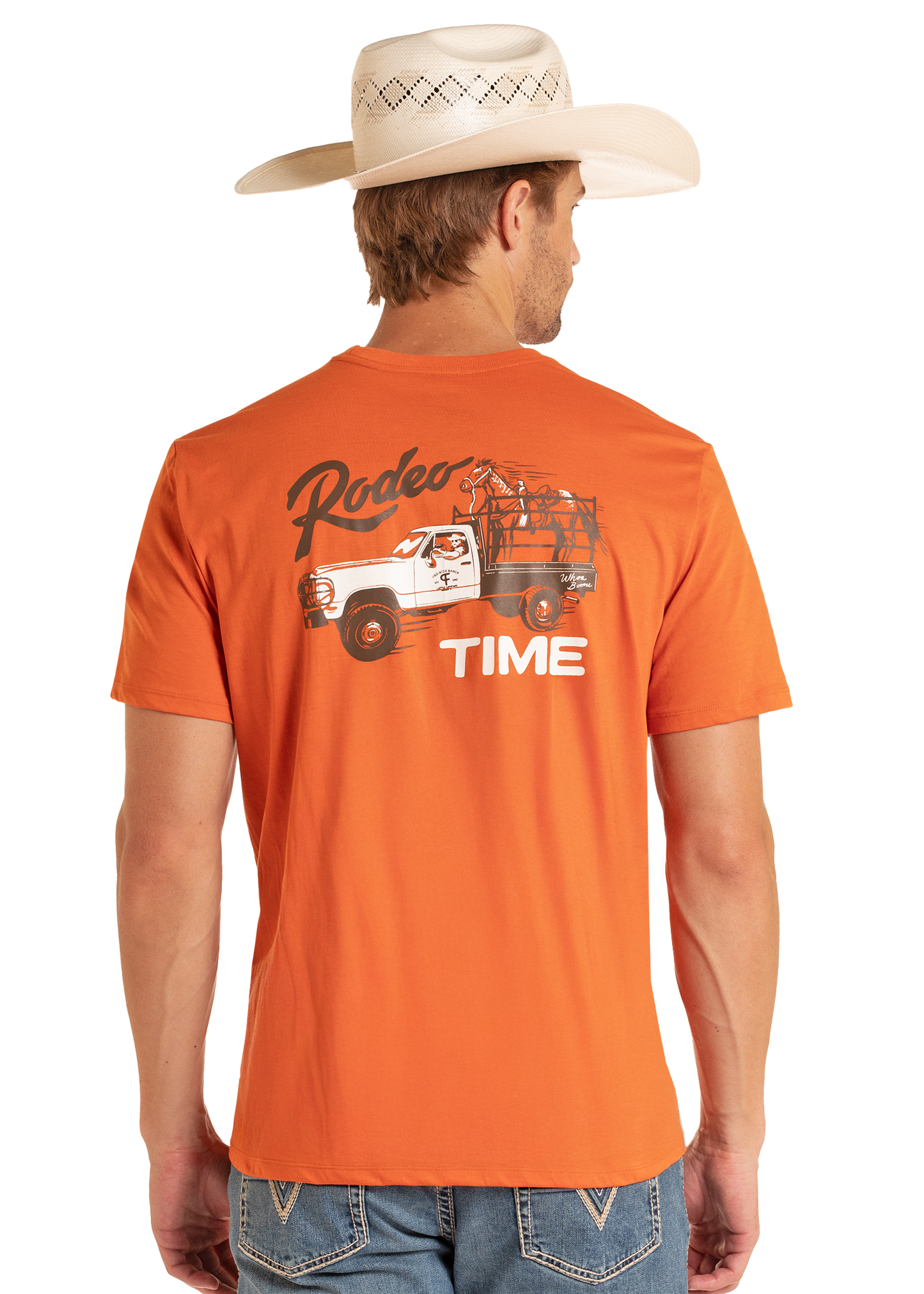 Man wearing an orange t-shirt with a graphic design and text, standing against a white background