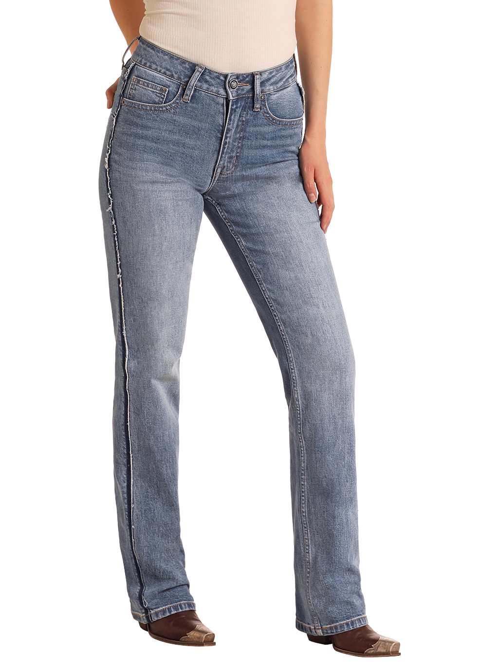 Woman wearing a beige sleeveless top and blue jeans with a white background
