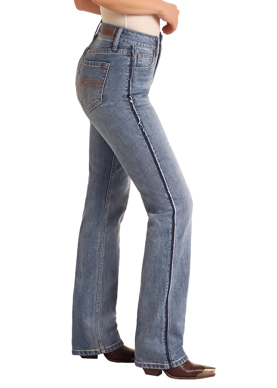 Woman wearing a cowboy hat and blue jeans on a white background