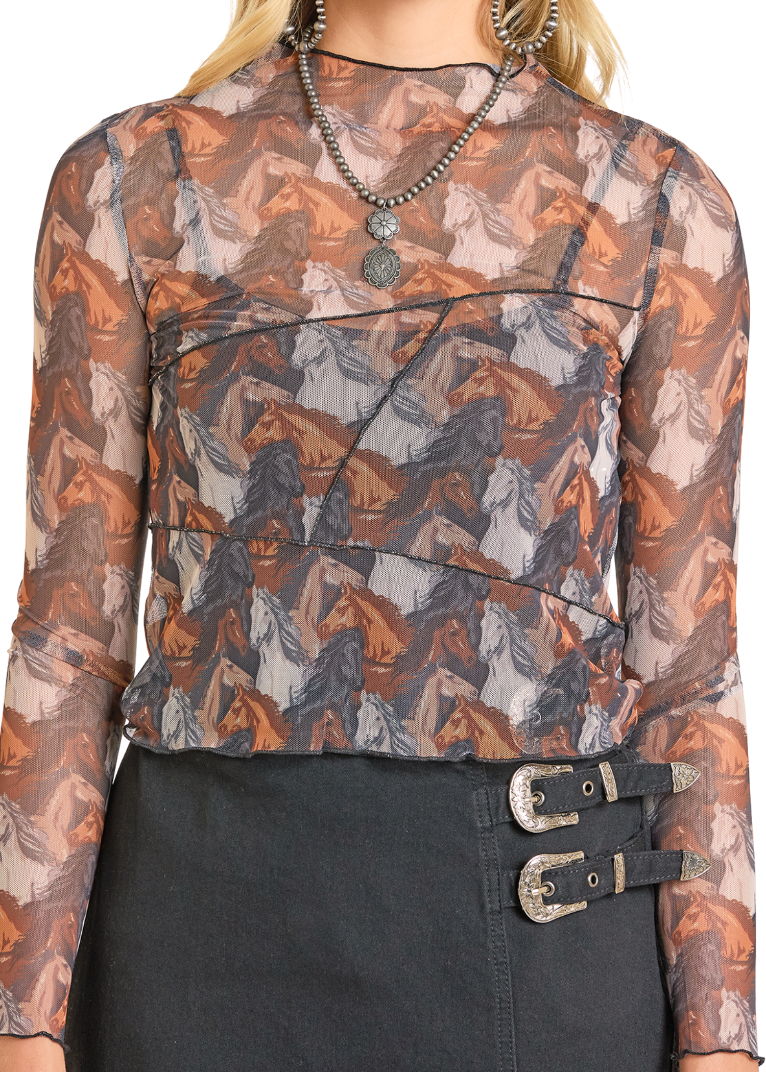 Top with horse pattern and black skirt with buckles on a white background
