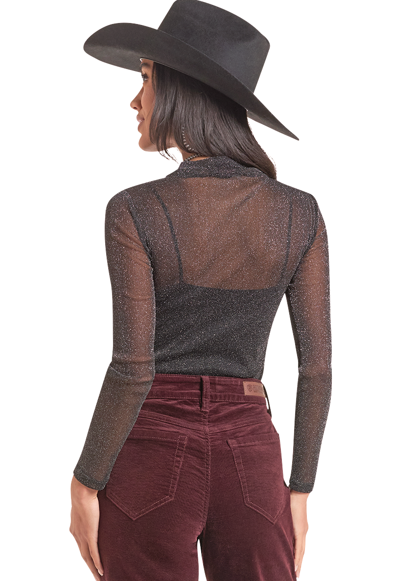 The back of a woman wearing a black lurex long sleeve top. 