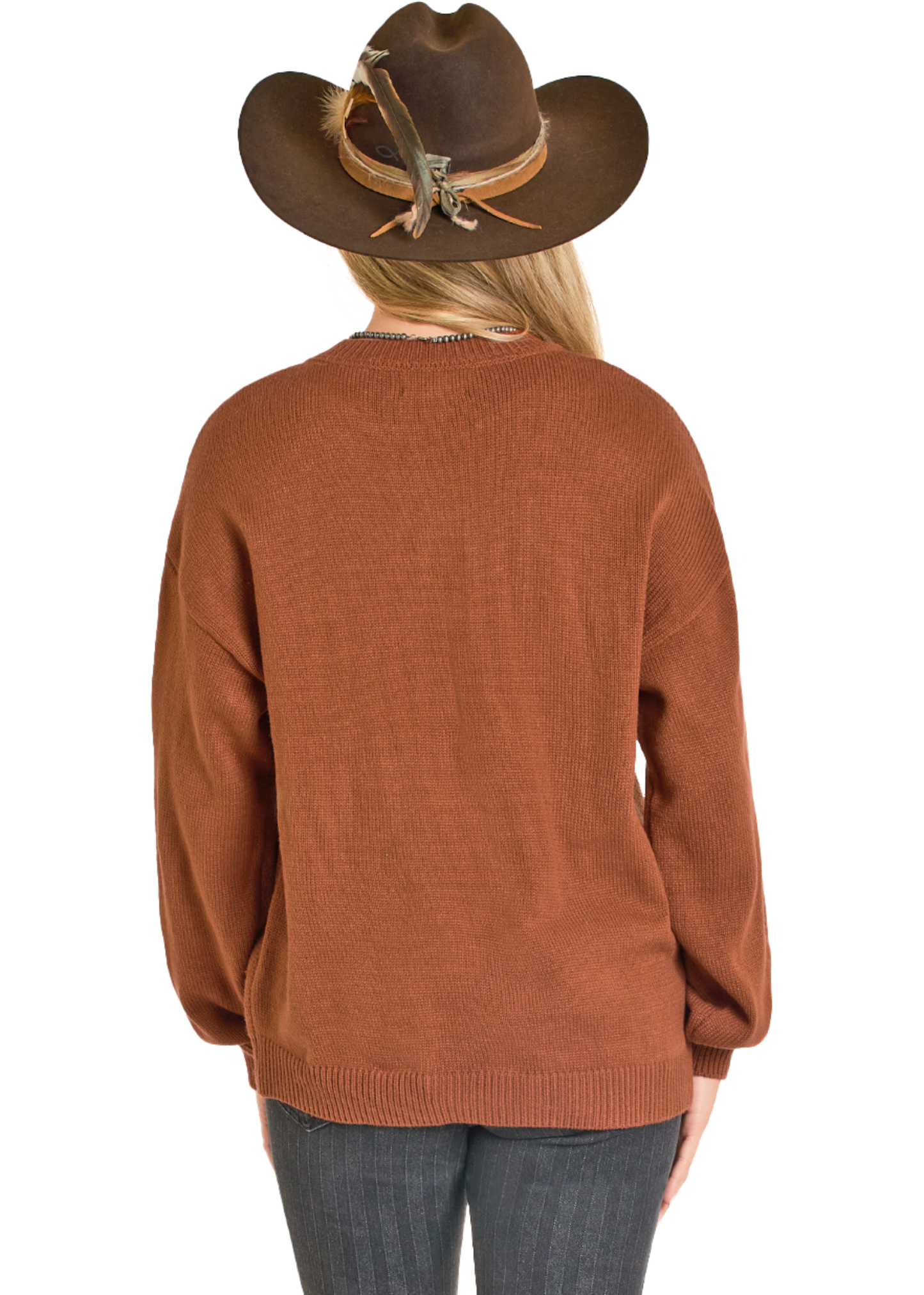 Person wearing a brown sweater and cowboy hat on a white background