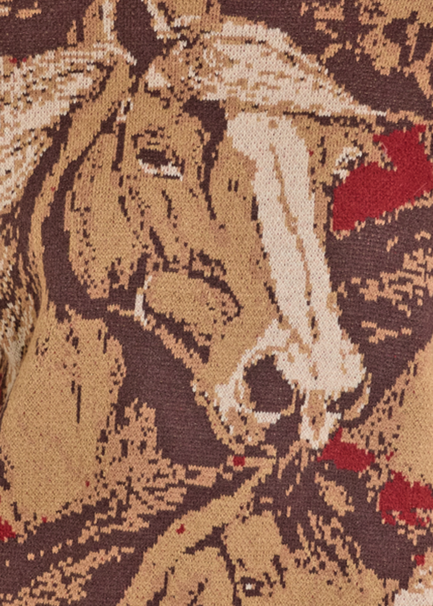 Close-up of a fabric with a horse and rider pattern