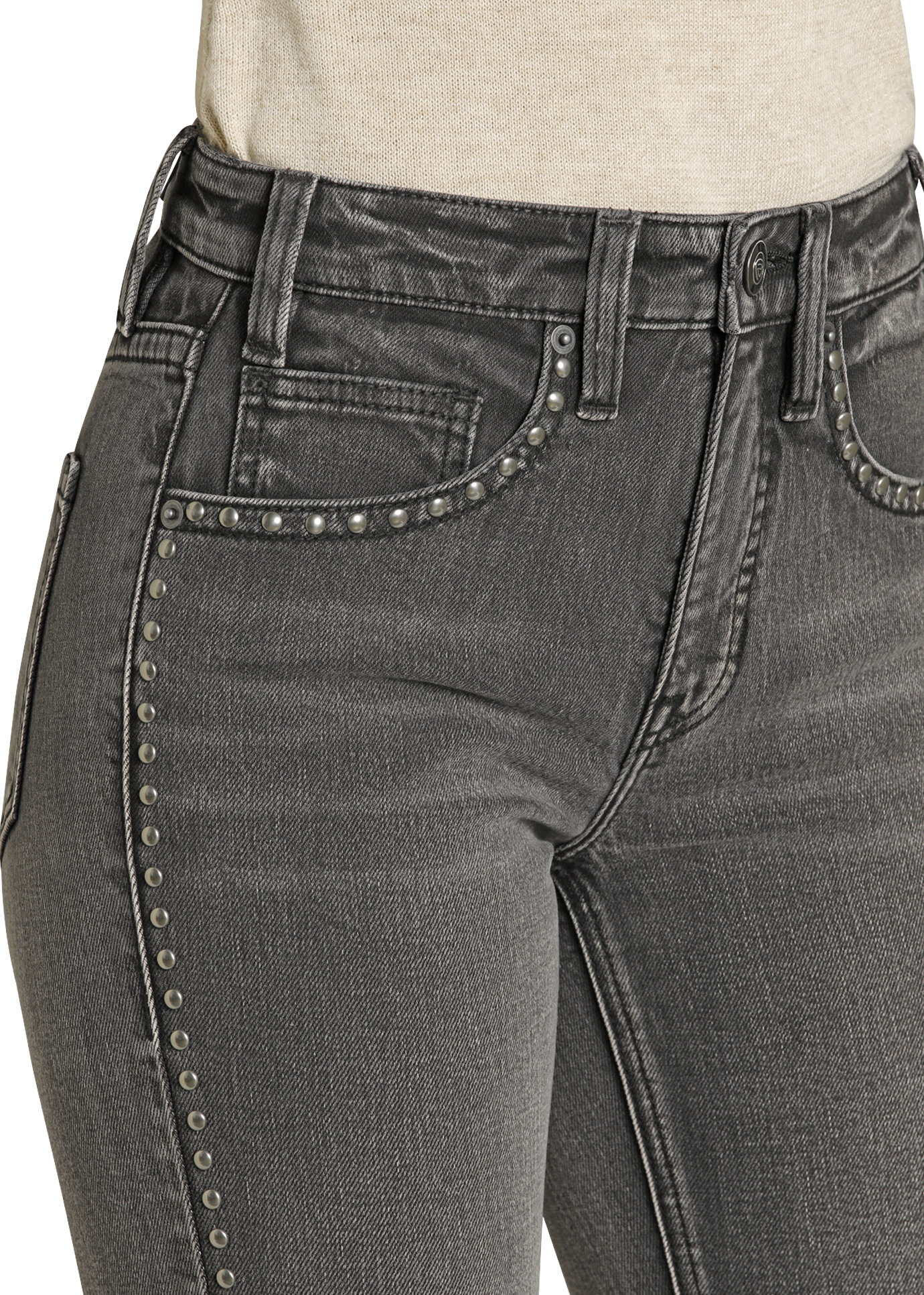 Close-up of gray jeans with studded details on a mannequin.