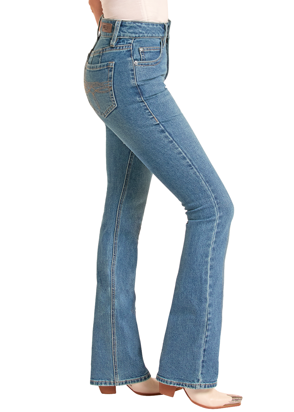 Woman wearing blue jeans and a beige cowboy hat on a white background