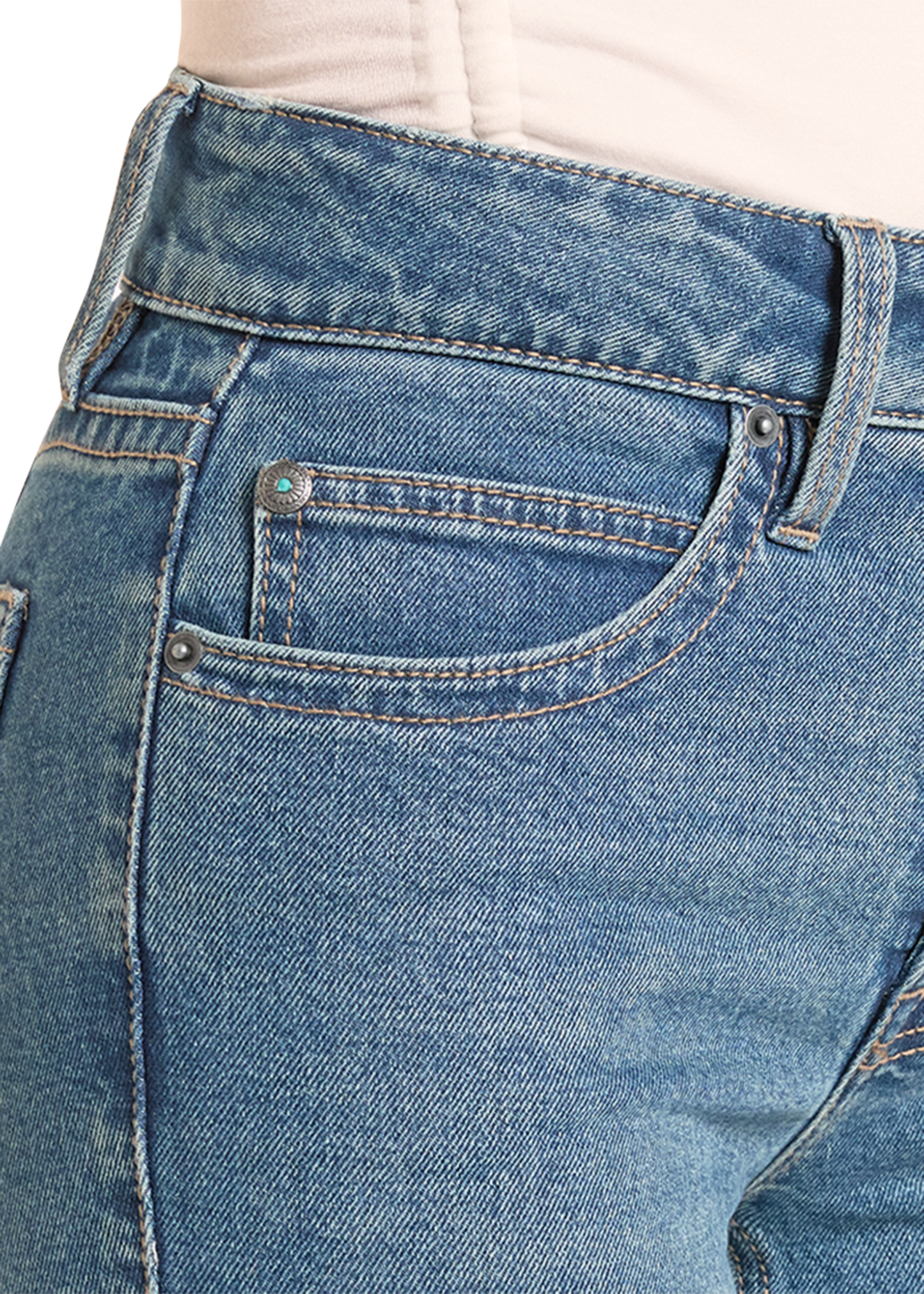 Close-up of blue jeans with a focus on the back pocket.
