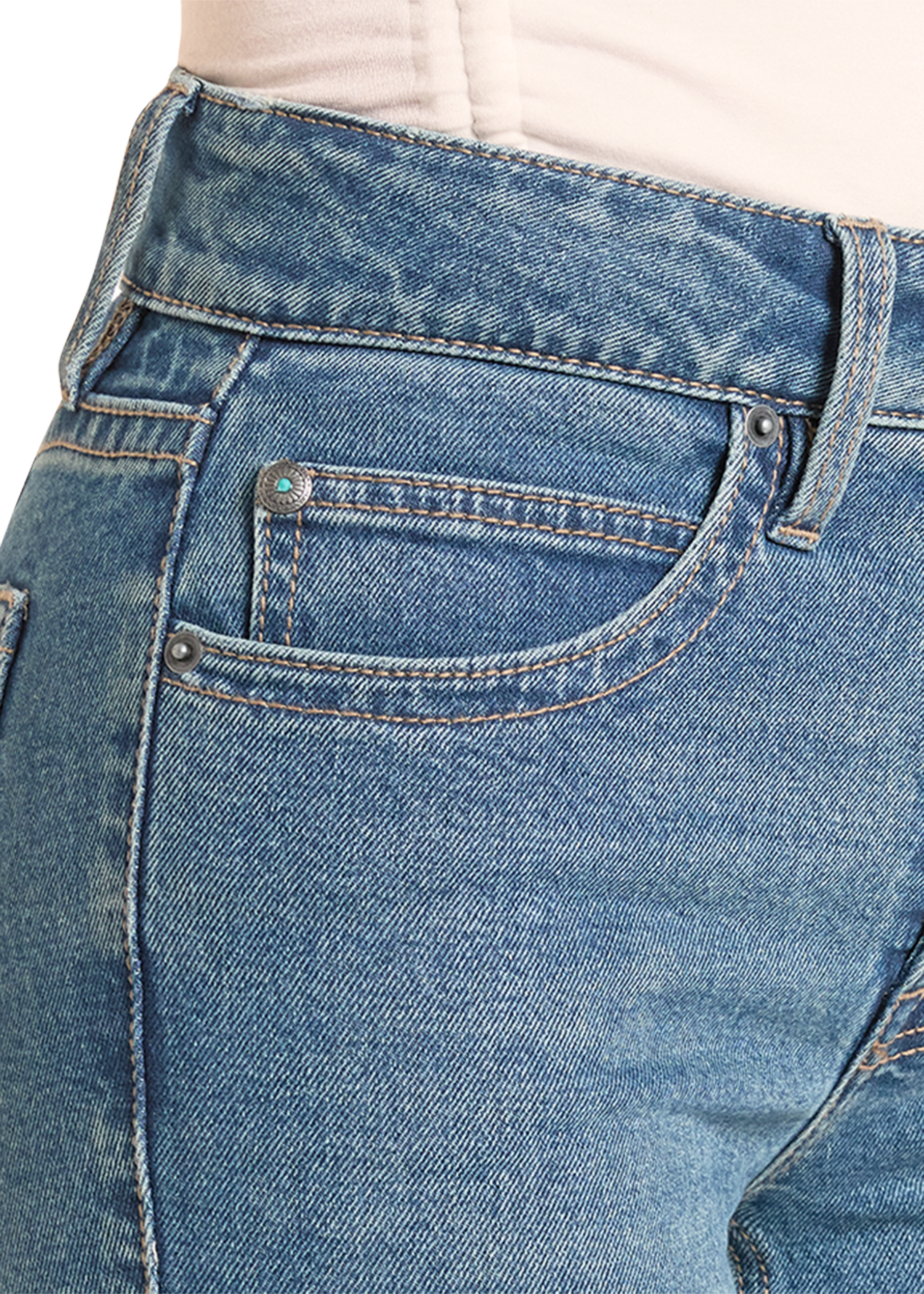 Close-up of blue jeans with a focus on the back pocket.