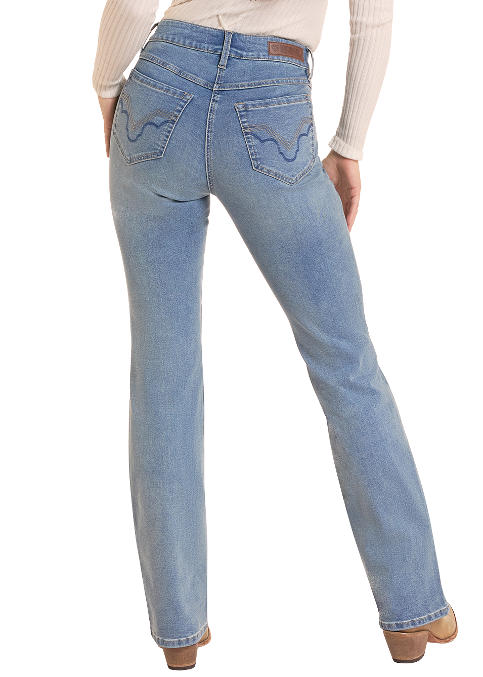A woman shown from the back wearing a beige wide-brim hat, a cream ribbed long-sleeve top, and light-wash blue jeans against a plain white background.