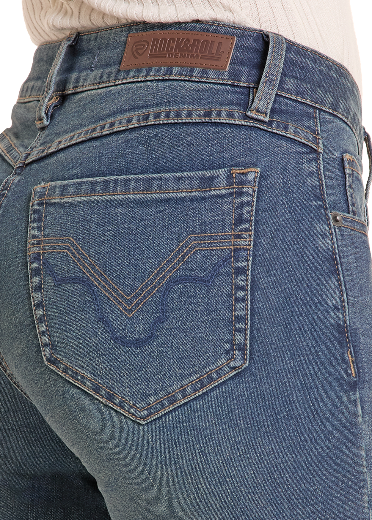 Close-up rear view of a person wearing blue denim jeans, showing the back pocket with decorative stitching and a brown leather Buckroll brand patch at the waistband.