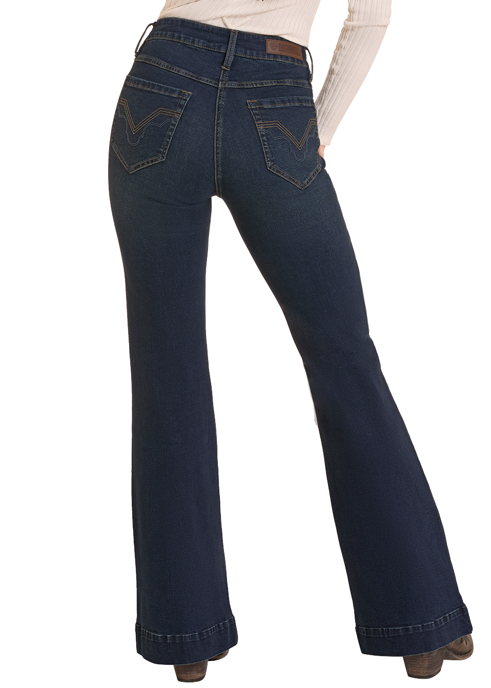 A woman shown from the back wearing dark blue flared jeans, a cream ribbed long-sleeve top, and a tan cowboy hat against a plain white background.