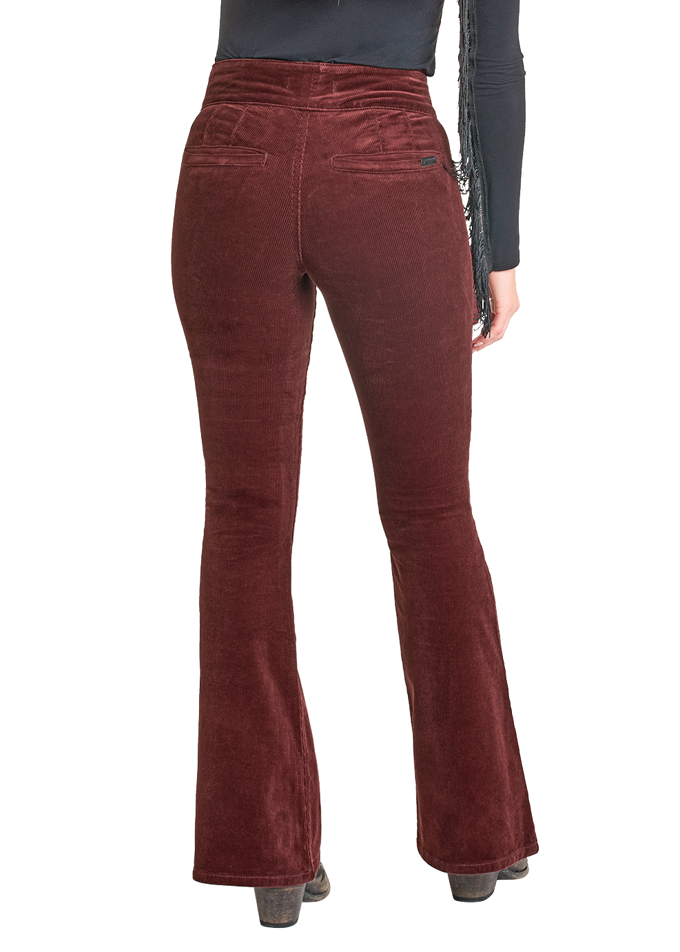 Person wearing a black cowboy hat, black long-sleeve top, and red flared pants on a white background