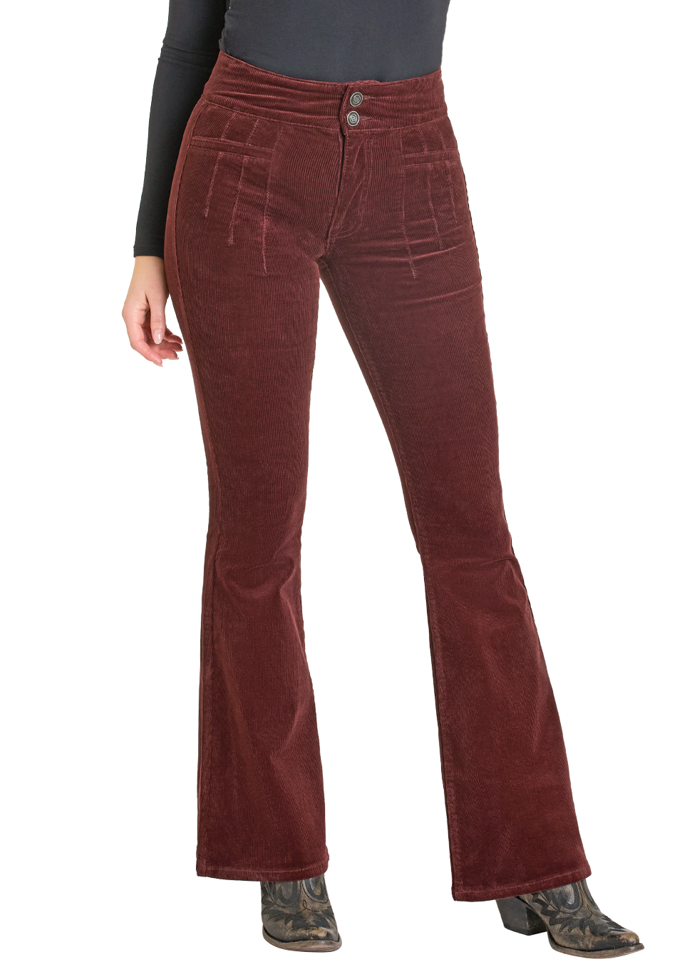 Woman wearing a black cowboy hat, black top, and red flared pants on a white background