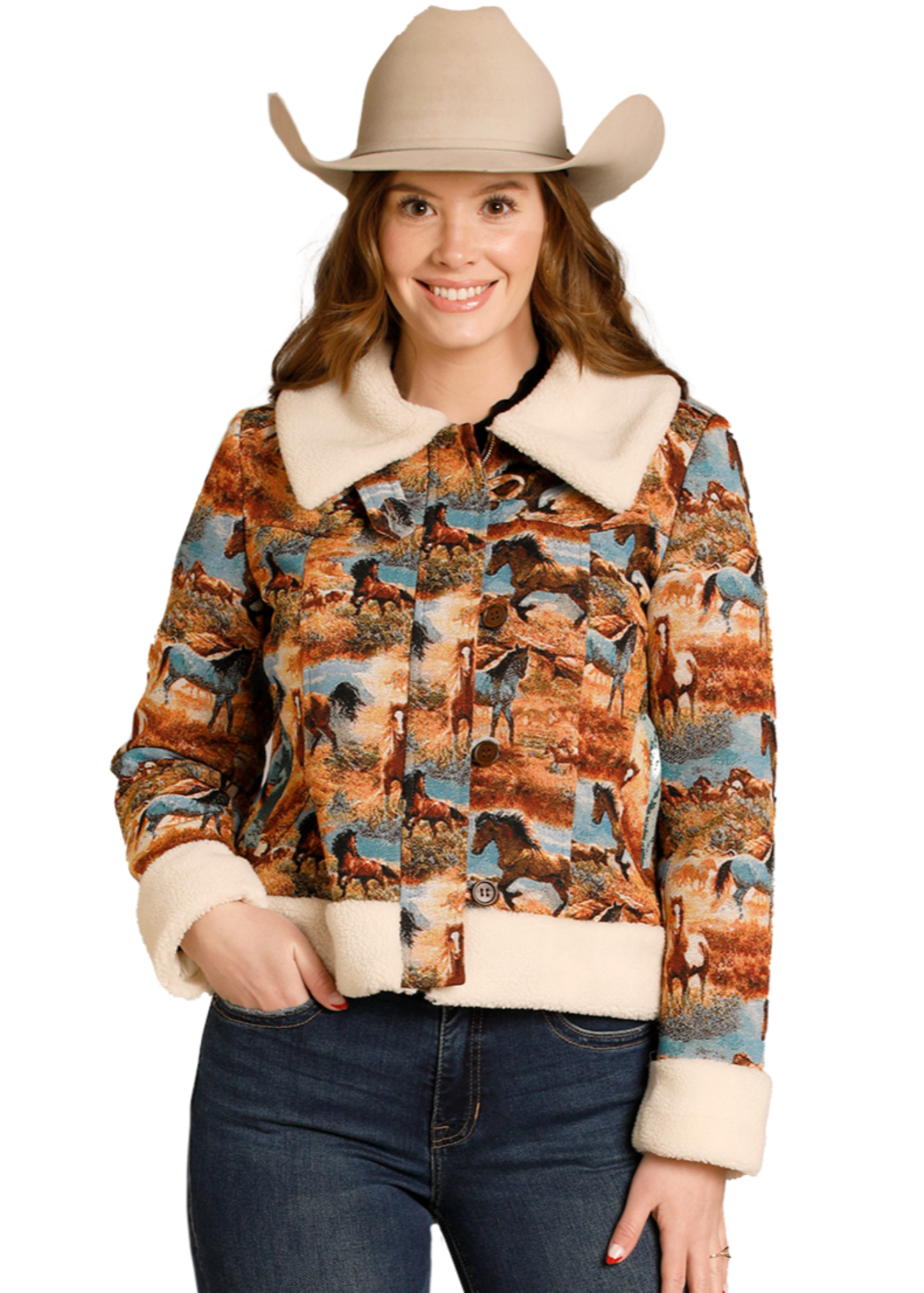 Woman wearing a patterned jacket, jeans, and a cowboy hat on a white background
