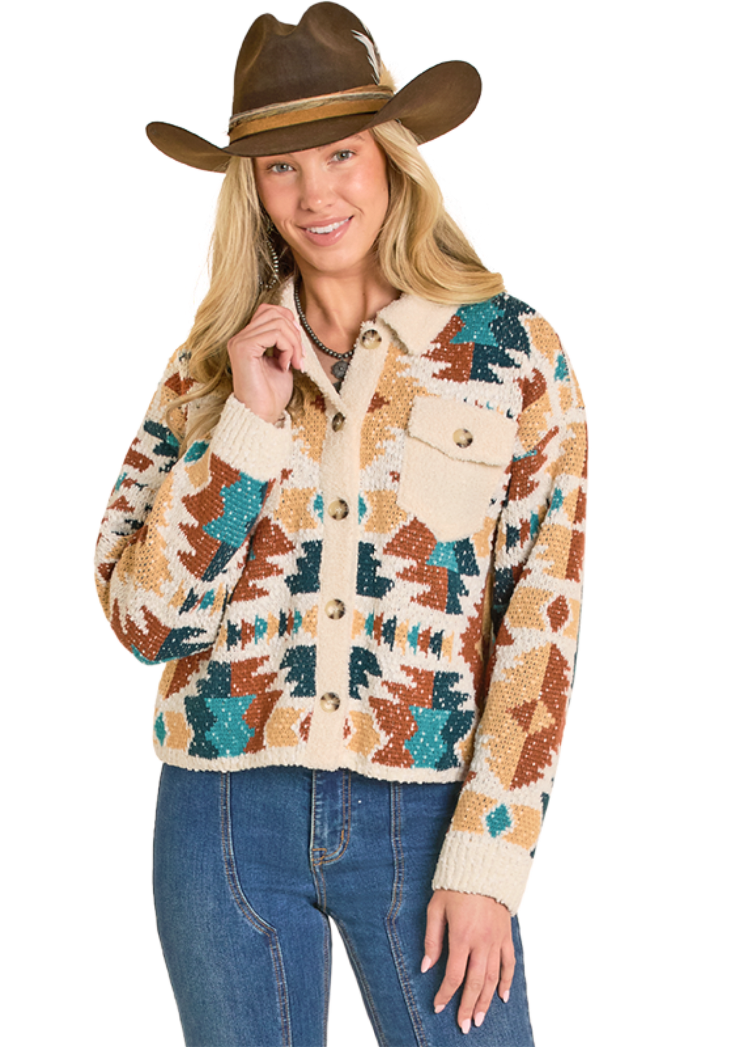 Woman wearing a patterned cardigan and cowboy hat on a white background