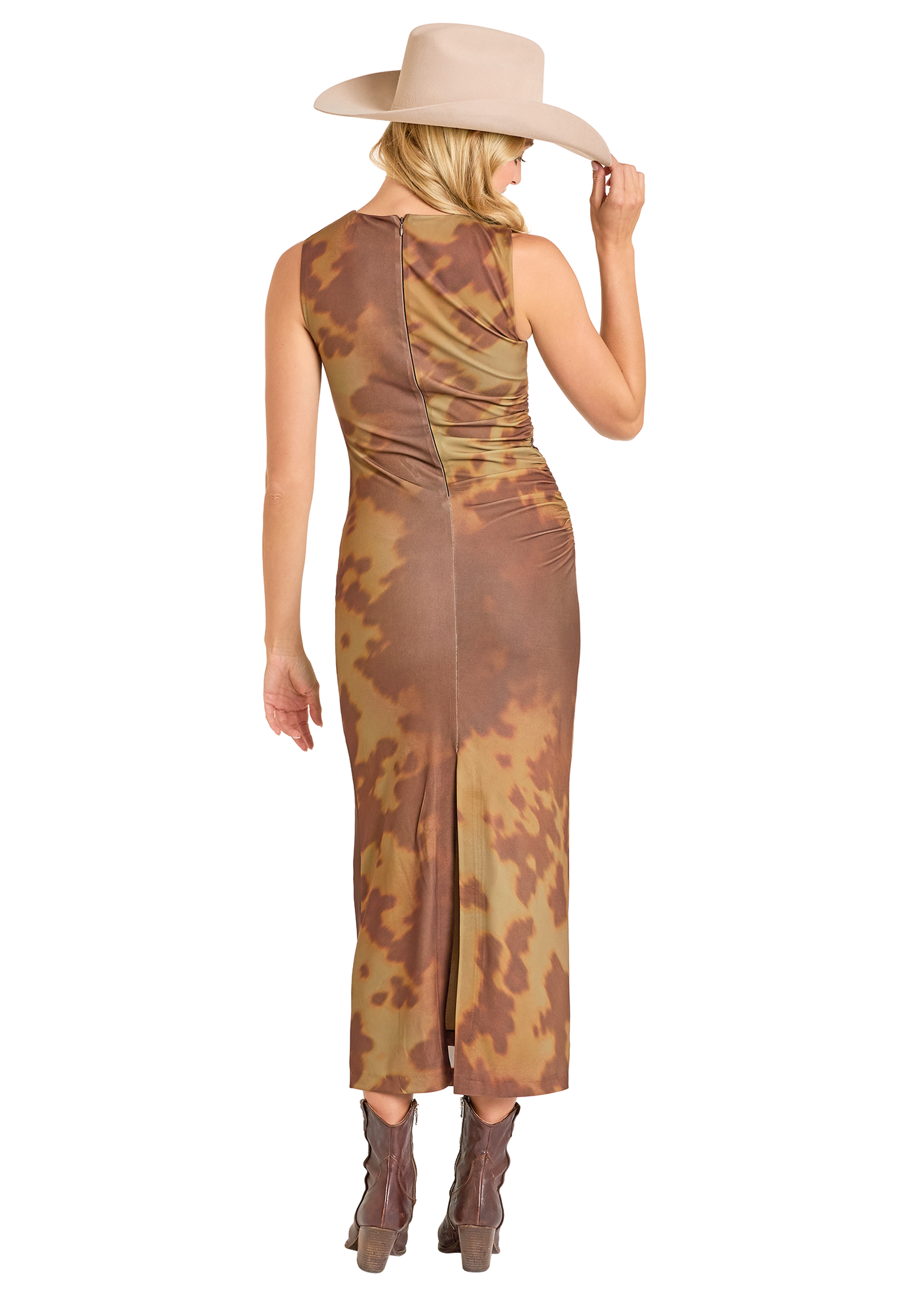 Woman wearing a camouflage dress and beige hat on a white background