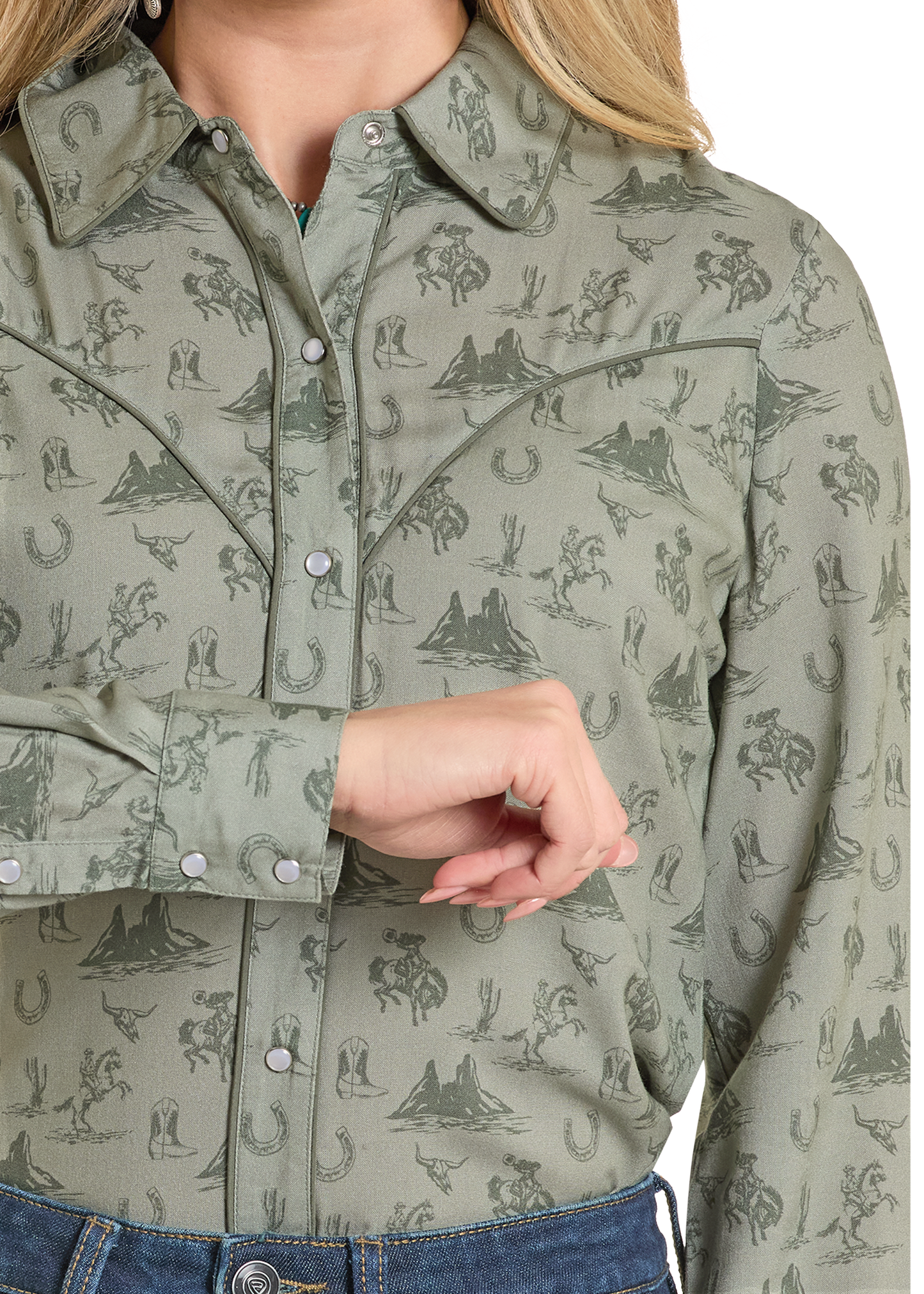 Green patterned shirt with a close-up of a hand, worn by a person.