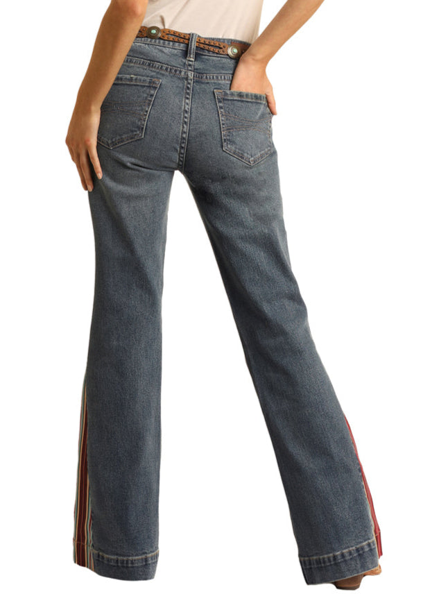 Person wearing a white shirt, blue jeans, and a cowboy hat on a white background