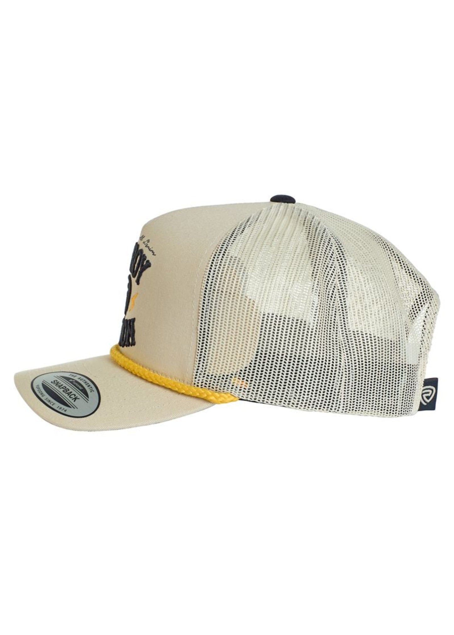 The Rock & Roll Denim Cowboy Nation Cap is a beige trucker hat with mesh back, curved bill, yellow rope front detail, patch, brim sticker, and adjustable snapback for a perfect fit.