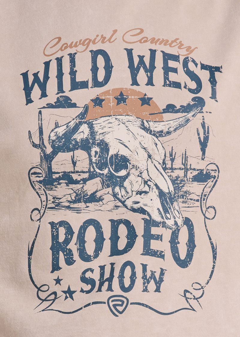 A close-up of a beige graphic print featuring a distressed western design with the words 'Cowgirl Country WILD WEST RODEO SHOW' and an illustration of a steer skull under a desert sunset.