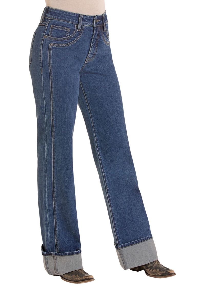 Side view of woman in a wide leg cuff jean. 