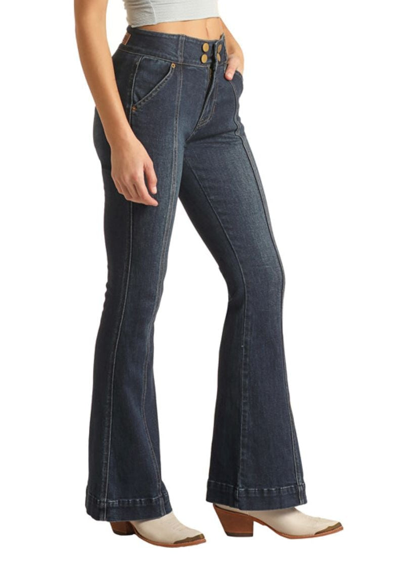 Woman wearing a white tank top, blue jeans, and a cowboy hat on a white background