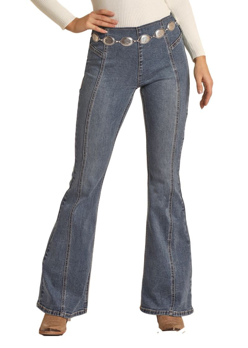 Blue jeans with decorative buttons on a white background