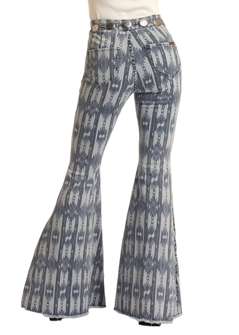 Person wearing a white shirt and patterned pants with a hat on a white background