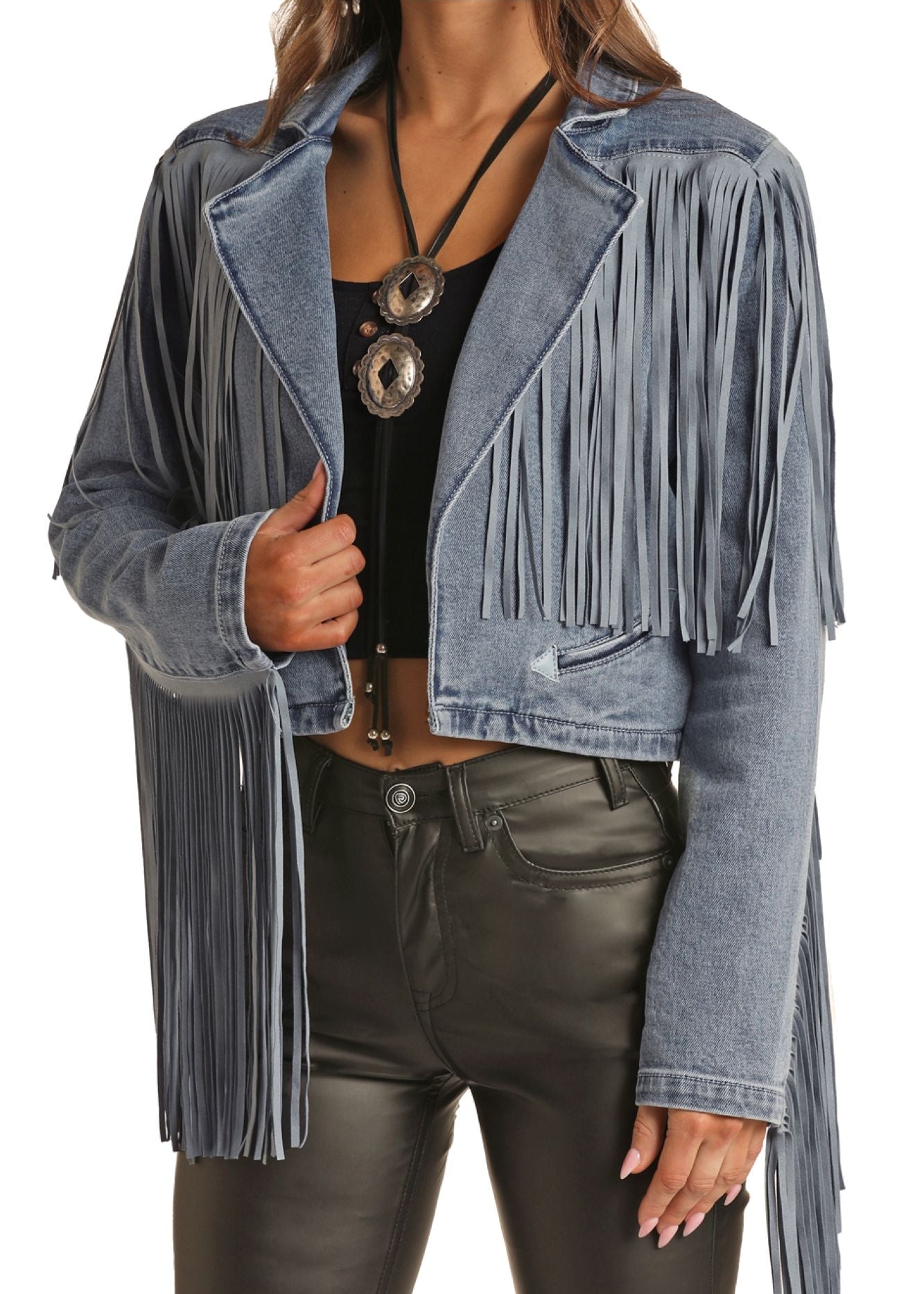 Denim jacket with fringe details on a white background