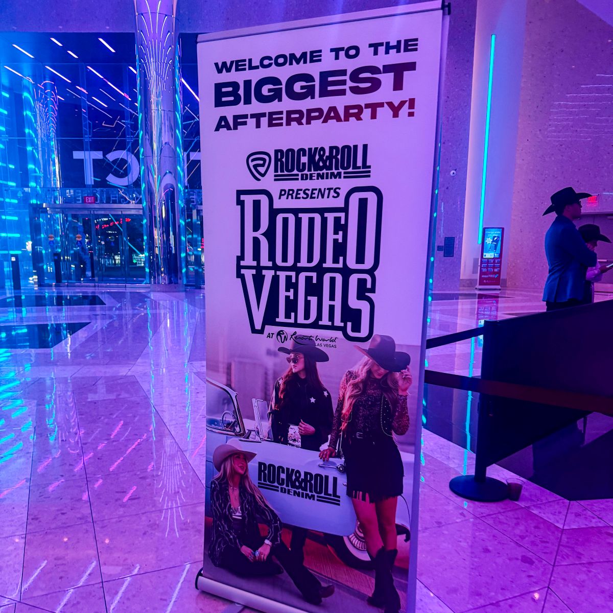 Promotional banner for 'Rodeo Vegas' event with people in cowboy hats in a vibrant indoor setting.