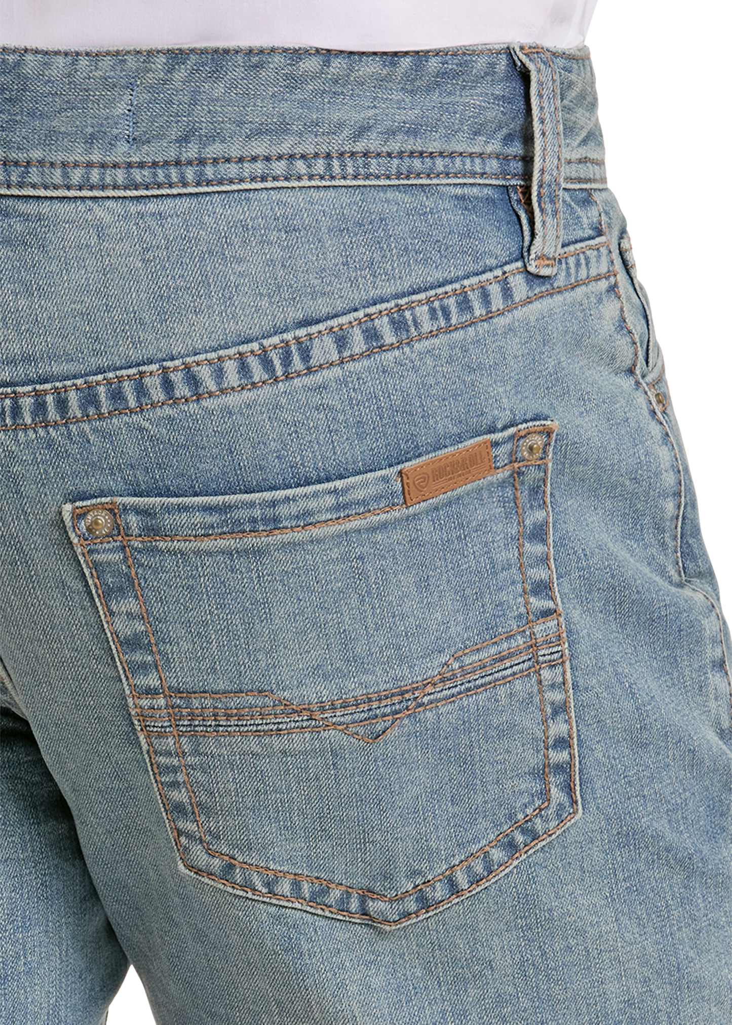 Close-up of the back waistband and pocket area of light blue denim jeans, showing a tan leather brand tab on the back pocket.
