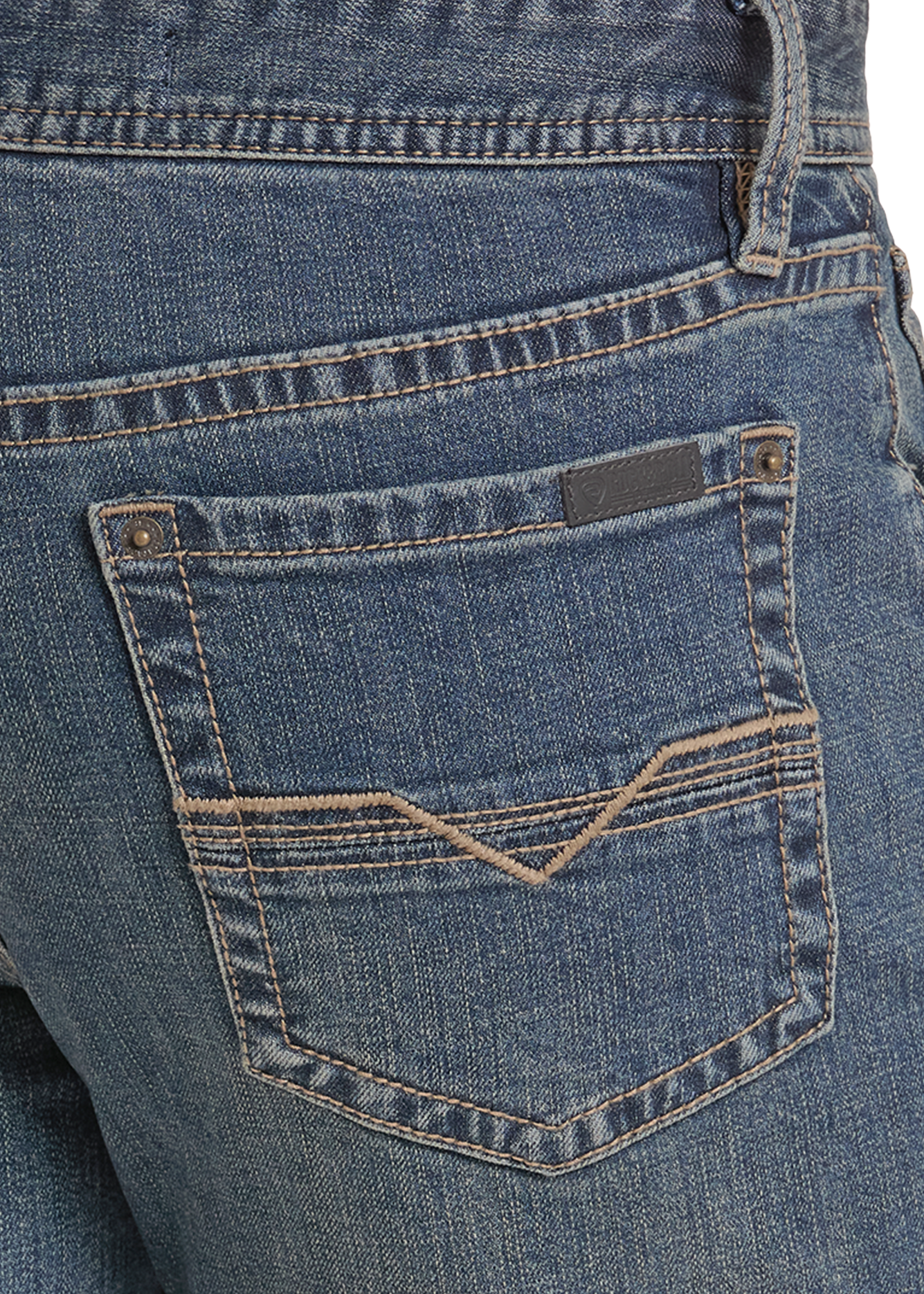 Close-up of the back pocket of blue denim jeans, showing the pocket, stitching, and a small dark brand patch.