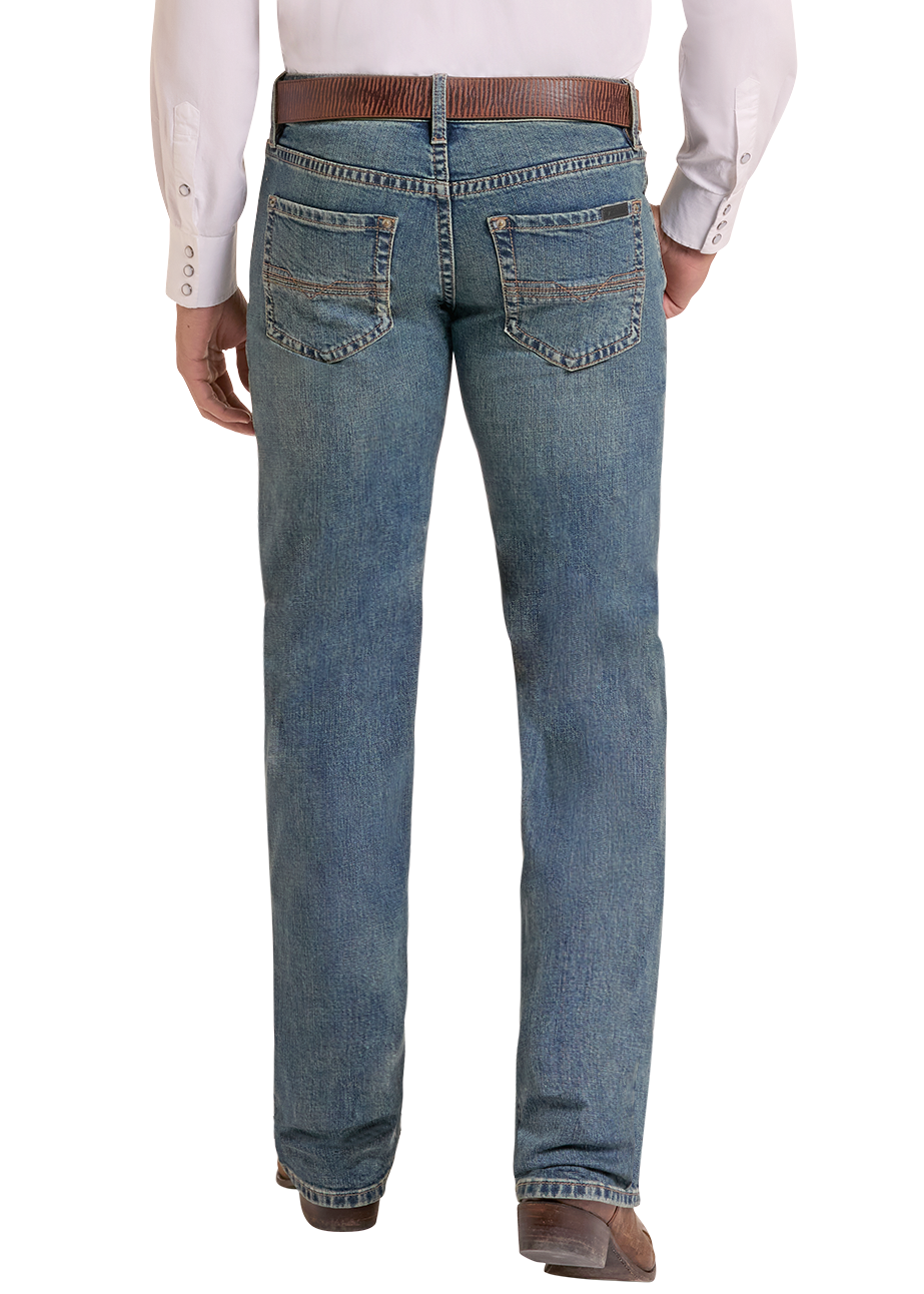Man wearing relaxed fit medium wash jeans from the back.