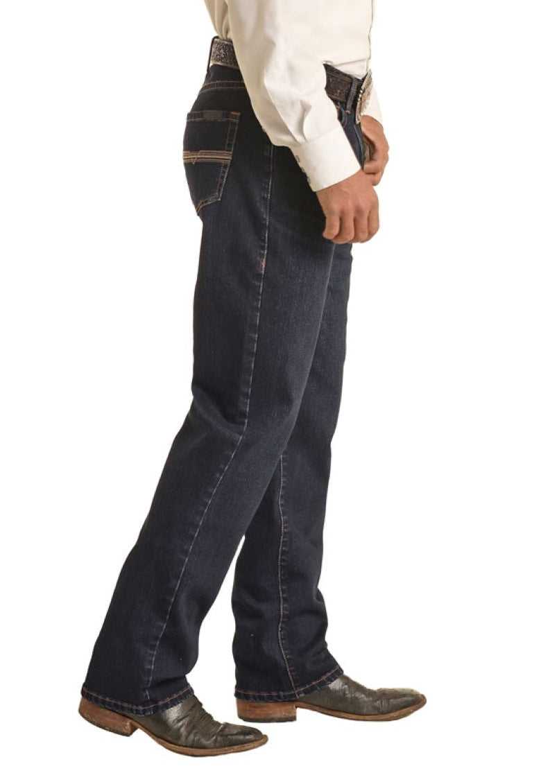 Man wearing a white shirt, dark jeans, and a straw hat on a white background