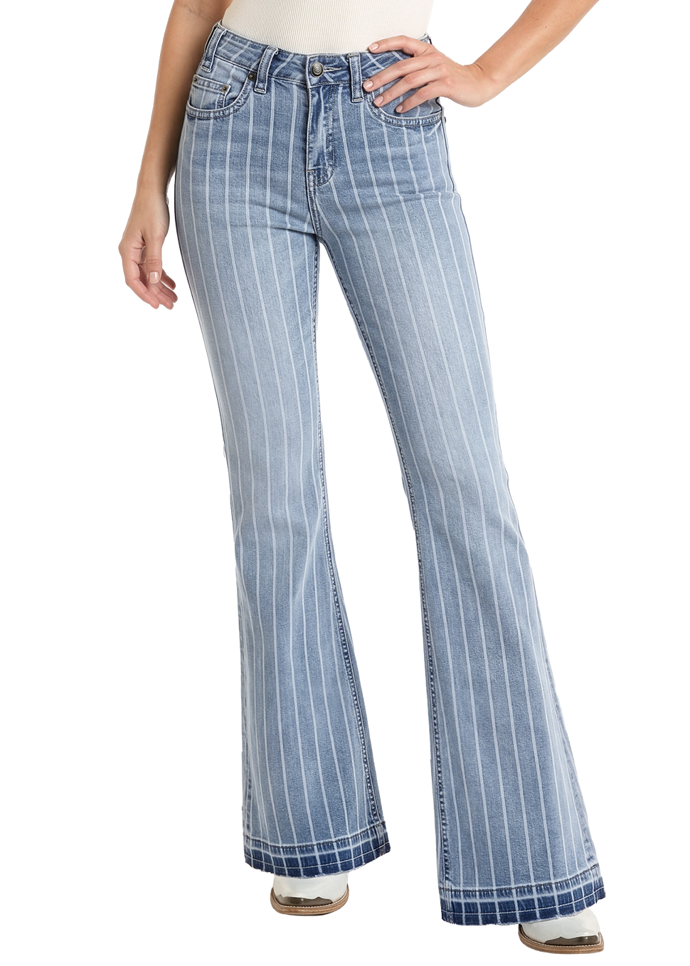 Woman wearing a white top and blue checkered flared pants with a straw hat on a white background