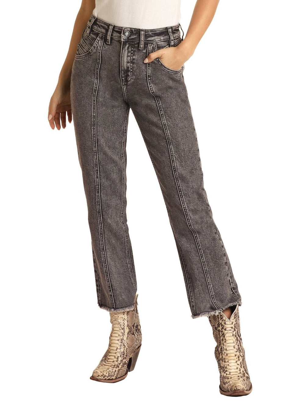 Woman wearing a white cowboy hat, white shirt, gray jeans, and leopard print boots on a white background