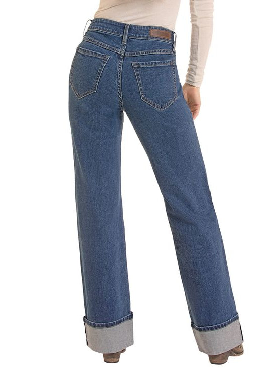 The back view of a woman in a wide leg cuff jean. 
