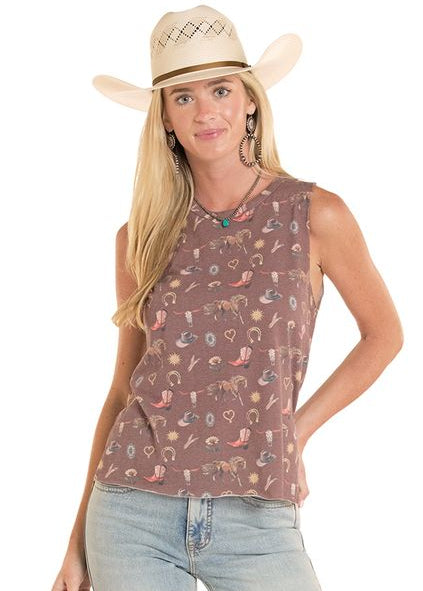 Woman wearing a sleeveless patterned top and light blue jeans on a white background