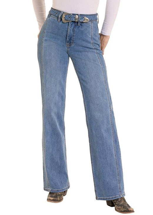 Woman wearing a wide leg pair of jeans with a western denim belt. 