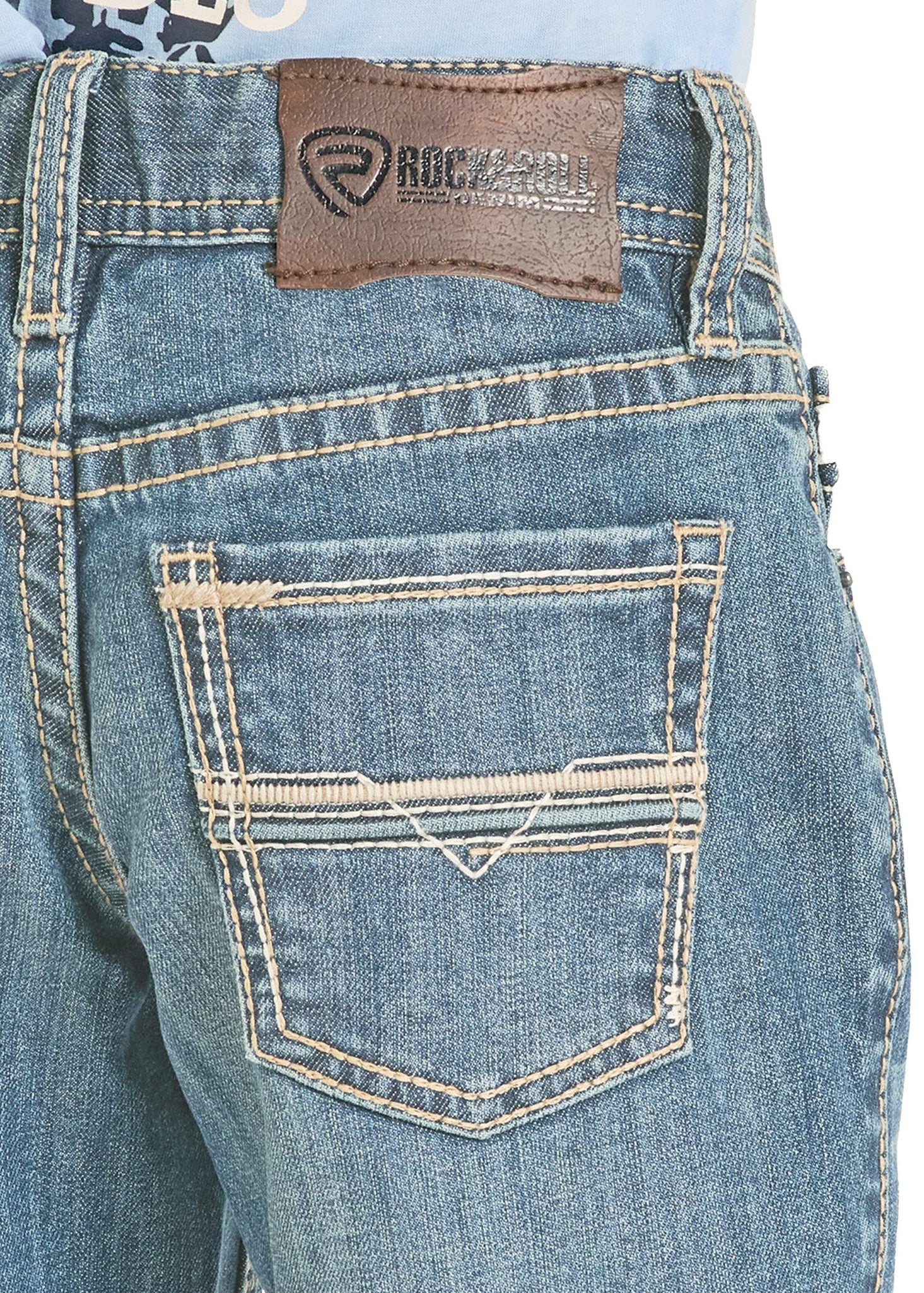 Close-up of blue jeans with a brand label on the back pocket.