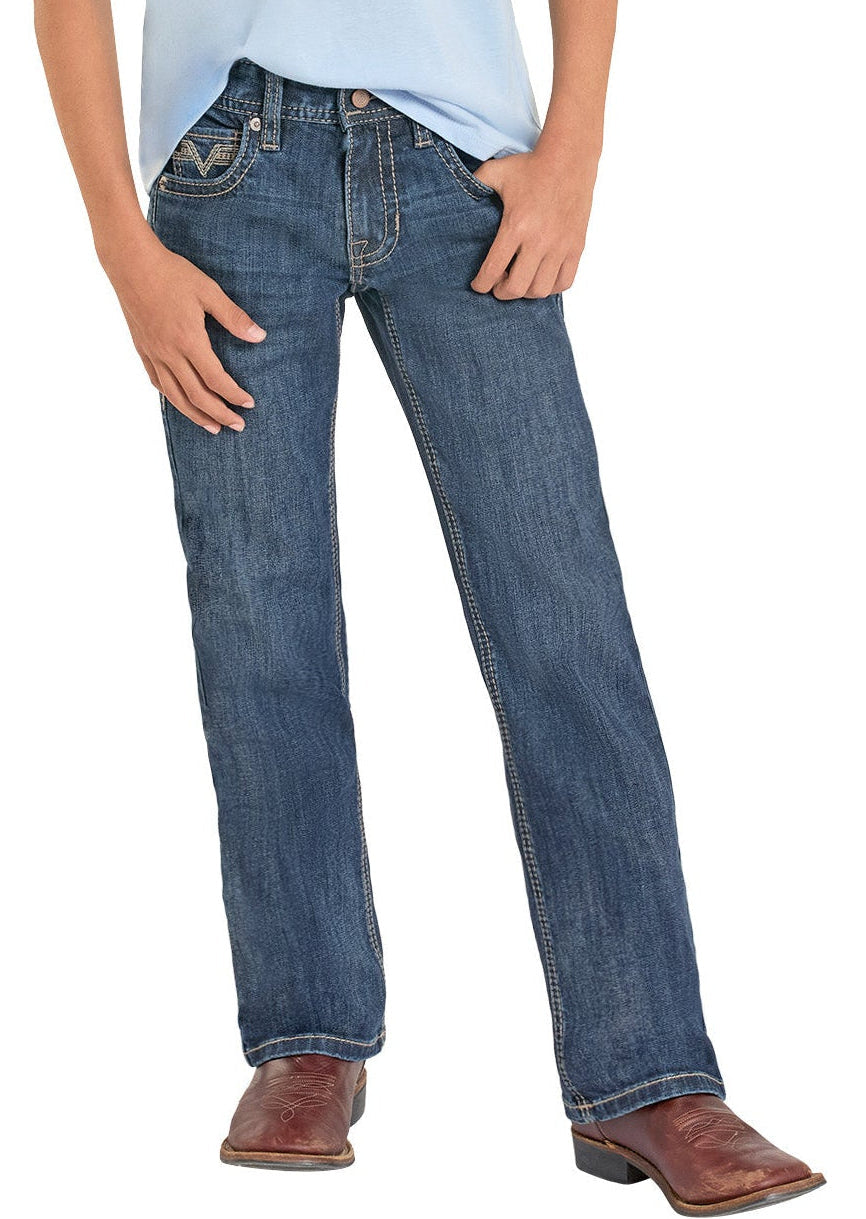 Boy wearing a light blue t-shirt and dark blue jeans on a white background