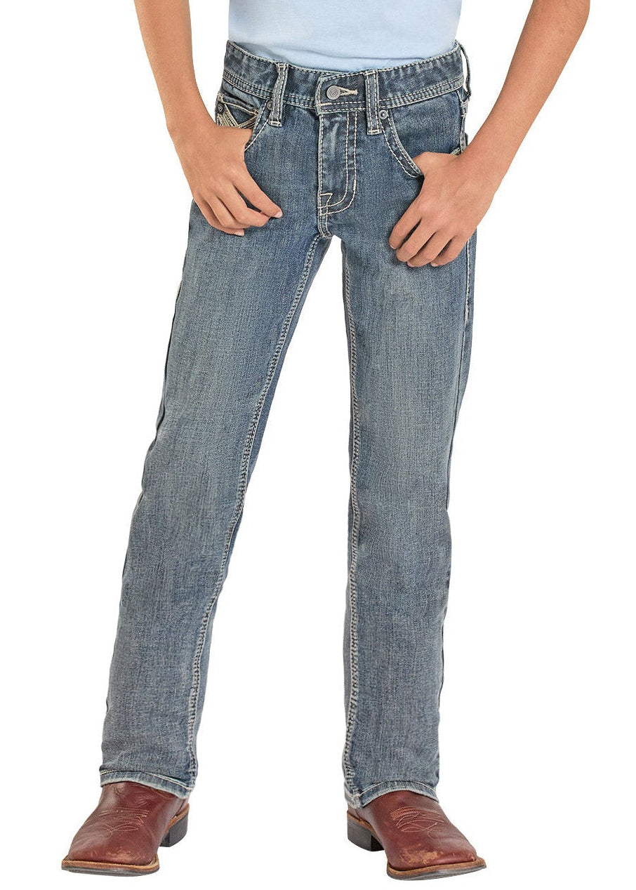 Child wearing a light blue t-shirt, jeans, and a cowboy hat on a white background