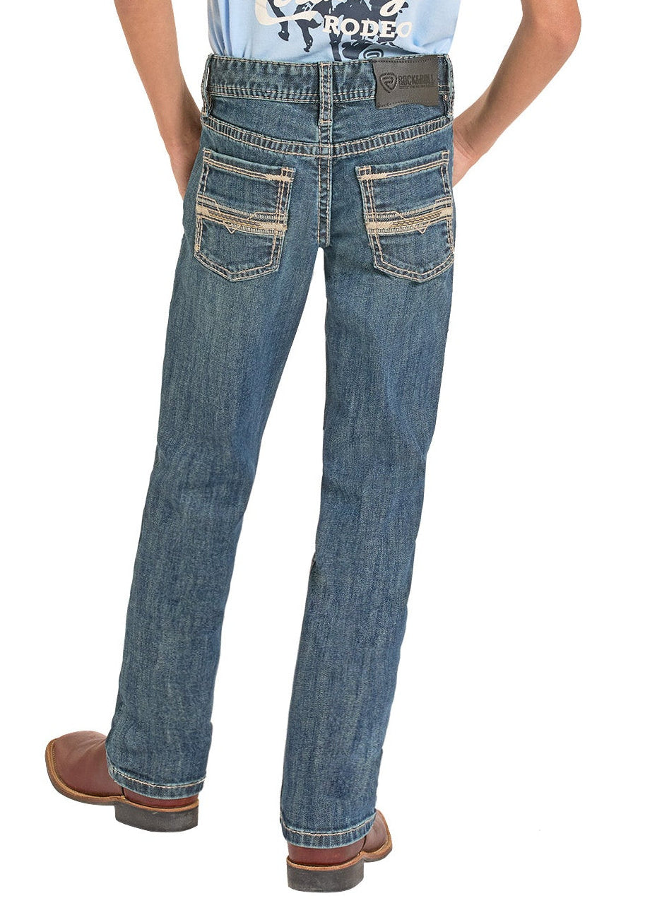 Person wearing a light blue t-shirt with text and graphics, blue jeans, and a cowboy hat on a white background