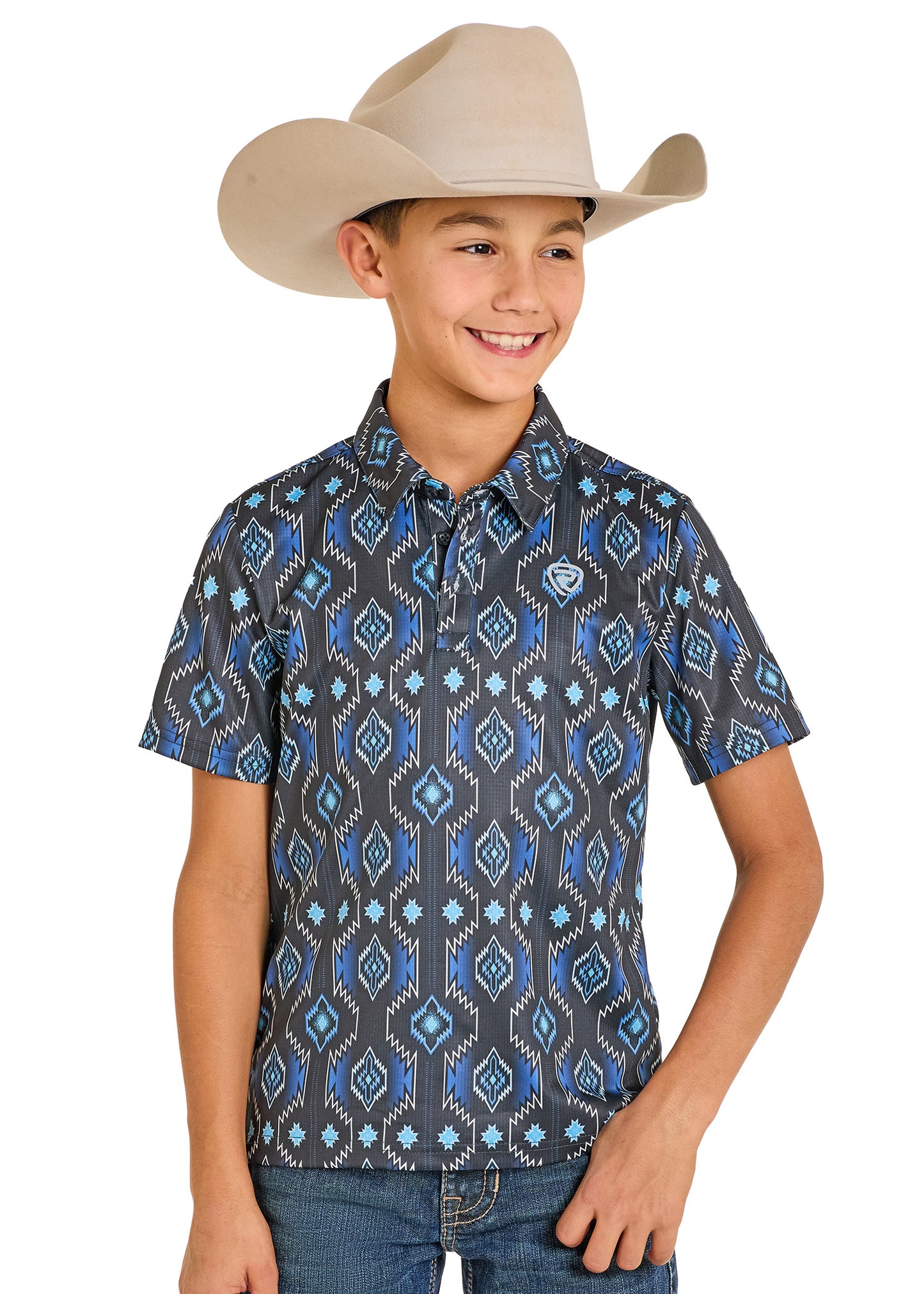 Child wearing a patterned shirt and cowboy hat on a white background