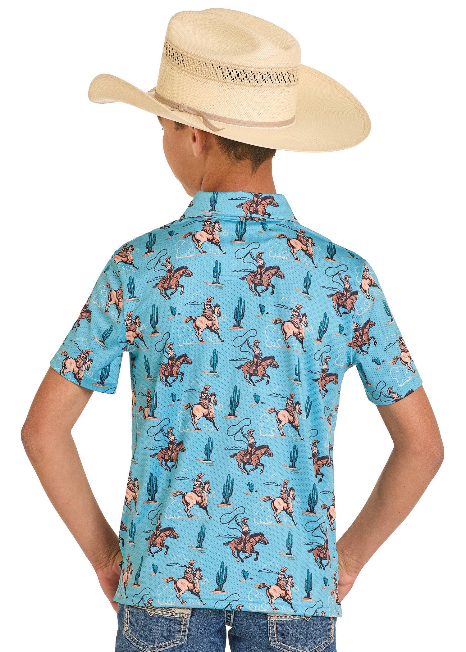 Child wearing a blue cowboy shirt with patterns and a beige cowboy hat on a white background