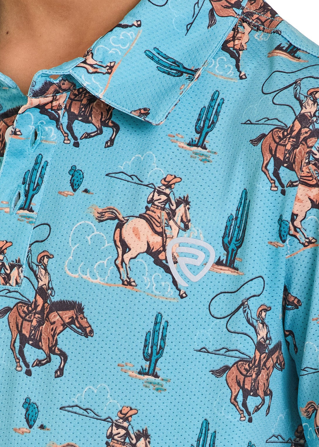 Close-up of a blue shirt with cowboy and horse pattern