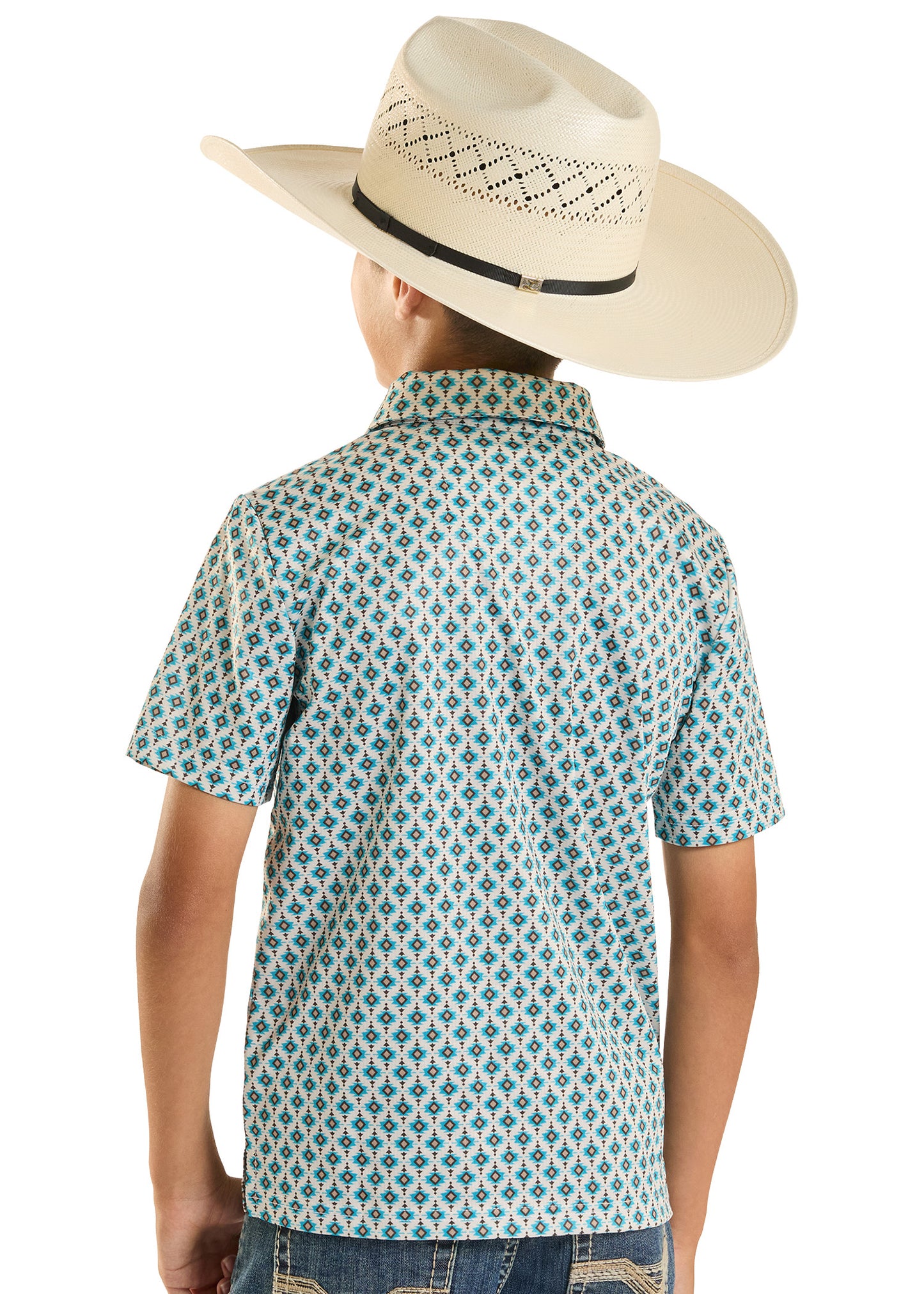 Person wearing a patterned shirt and cowboy hat on a plain background