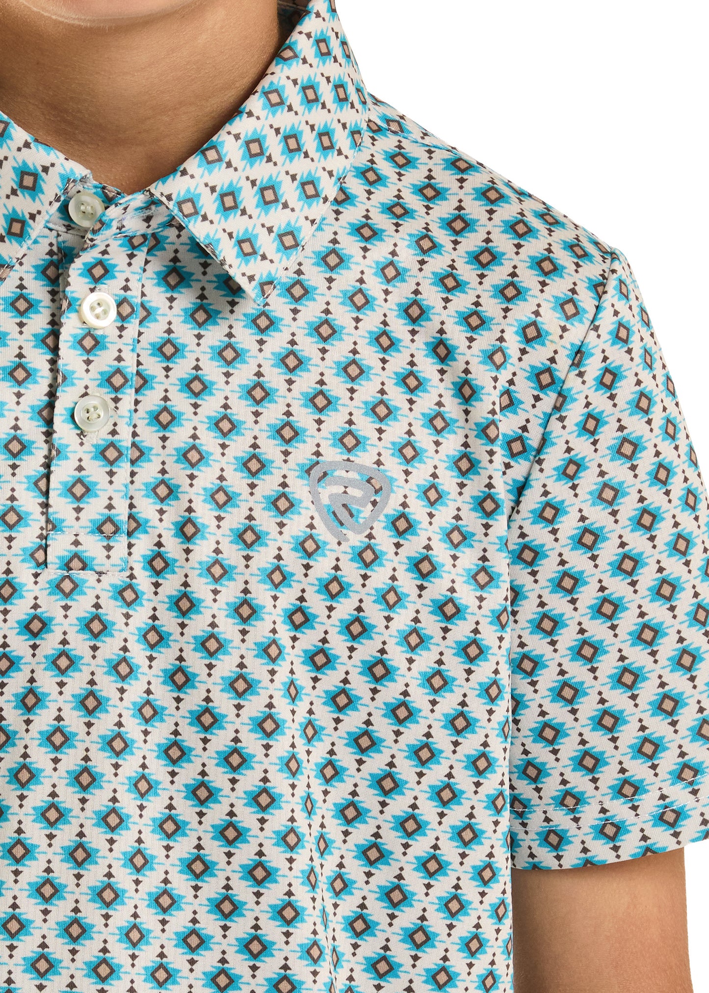 Close-up of a patterned shirt with blue and brown geometric design