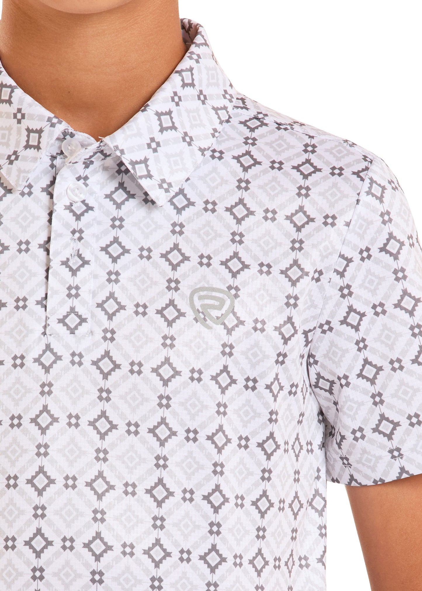Close-up of a patterned shirt with a brand logo on a white background