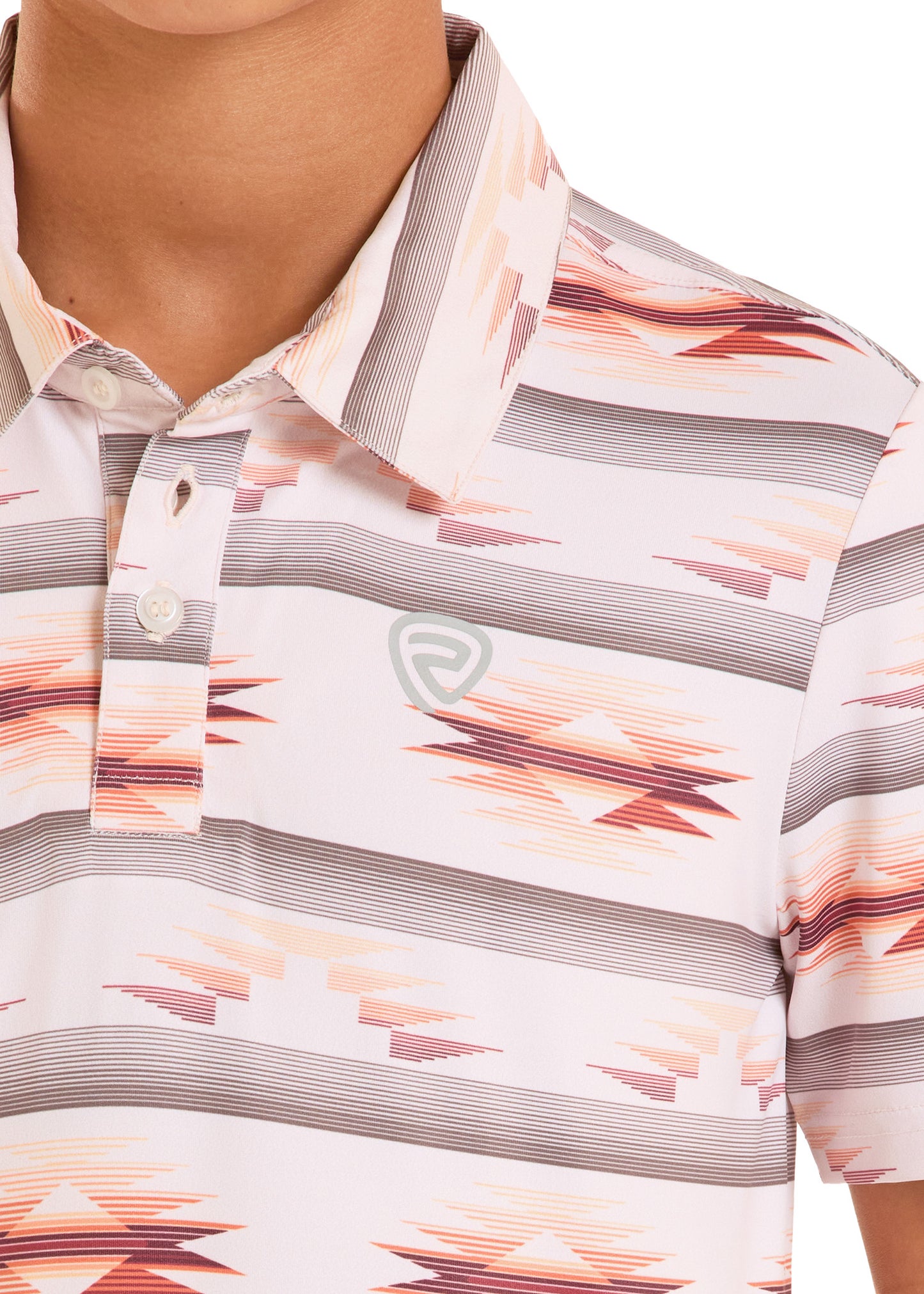 Close-up of a patterned shirt with a brand logo on a white background